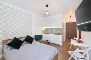 Kuchnia lub aneks kuchenny w obiekcie YOURAPART Chmielna Park