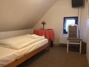 Postel nebo postele na pokoji v ubytování Krügers Hotel
