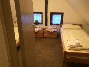 Postel nebo postele na pokoji v ubytování Krügers Hotel