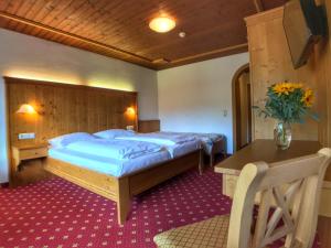 Voodi või voodid majutusasutuse Hotel Bechlwirt toas