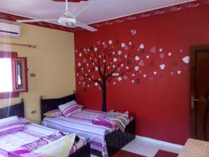 Postel nebo postele na pokoji v ubytování El-amin Guest House