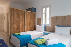 Postel nebo postele na pokoji v ubytování Edem Hotel