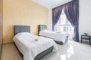 a hotel room with two beds and a window at Seasons Luxury Apartment By RR JBcity in Johor Bahru +47 photos