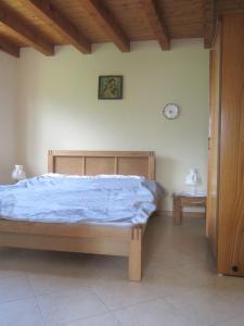 מיטה או מיטות בחדר ב-Casa di Bagattini