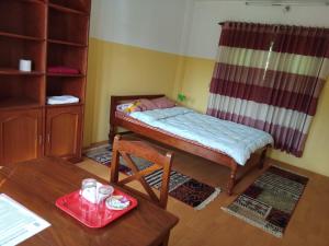 Katil atau katil-katil dalam bilik di Happy Sedi Lodge