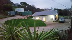 a house with a car parked in front of it at Inn Seaclusion in Devonport