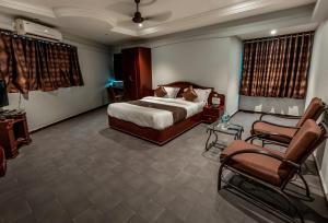 Letto o letti in una camera di Hotel JMC Group