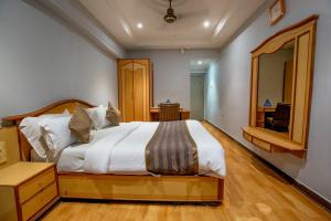 Letto o letti in una camera di Hotel JMC Group