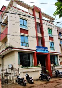 a group of motorcycles parked in front of a building at HOTEL PARK LAGOON in Puri