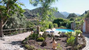 Vista de la piscina de Casa Vacacional Rural Villa Barranco de los Cernícalos o alrededores