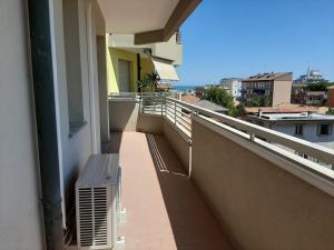 A balcony or terrace at DOMUS MARIS Viserba, Spiagge e Centro a 100 mt, PROMO MAGGIO FIERA MACFRUT, FIERAVICOLA, EXPO DENTAL, MEETING RIMINI