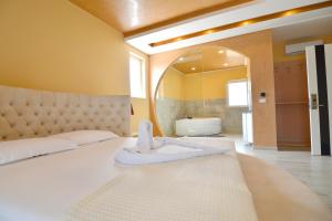 Voodi või voodid majutusasutuse Monte Mare Hotel toas
