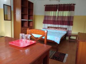 Katil atau katil-katil dalam bilik di Happy Sedi Lodge