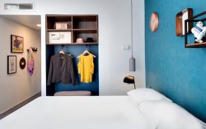 Postel nebo postele na pokoji v ubytování Hôtel ibis Styles Clermont-Ferrand Gare