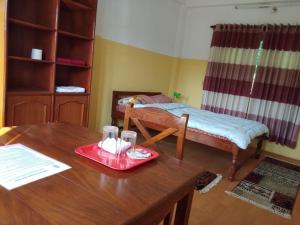 Katil atau katil-katil dalam bilik di Happy Sedi Lodge