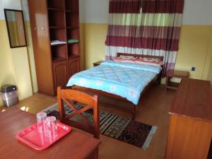 Katil atau katil-katil dalam bilik di Happy Sedi Lodge