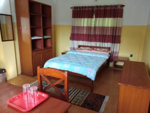 Katil atau katil-katil dalam bilik di Happy Sedi Lodge