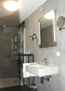 Koupelna v ubytování Hotel Hamann