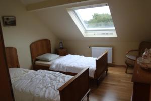 A bed or beds in a room at Casa Léon