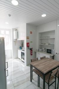 Кухня или кухненски бокс в Change The World Hostels - Cascais - Estoril
