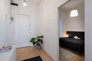 Ein Bett oder Betten in einem Zimmer der Unterkunft Baixa24 •P2L• Apartamento T1 no centro histórico