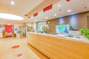 Ο χώρος του λόμπι ή της ρεσεψιόν στο 7Days Premium Beijing Wangjing