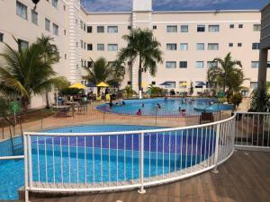 A piscina localizada em Hotel Encontro das Águas ou nos arredores
