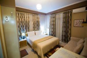 DEA Hotel 2002客房内的一张或多张床位