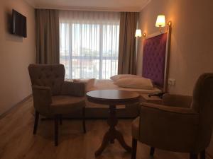 Posezení v ubytování Cadde Suite Bakırköy