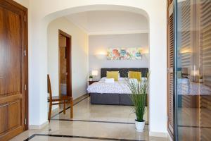 Postel nebo postele na pokoji v ubytování Hipoclub Villas,"Tabaro"villa + 36 fotografií