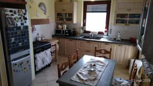 A kitchen or kitchenette at Residenza Montevile di Spaccini Gabriella