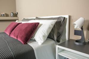 Кровать или кровати в номере CameLia