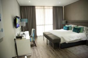ภาพในคลังภาพของ Le Elementos Boutique Hotel ในลุซากา