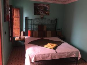 Llit o llits en una habitació de Riad Selma 37 fotos més