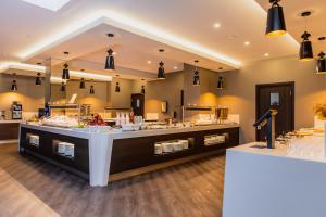 Kuchyň nebo kuchyňský kout v ubytování Gradiali Wellness and SPA
