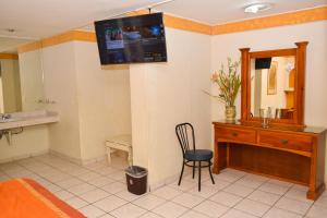 TV a/nebo společenská místnost v ubytování HOTEL BAEZA