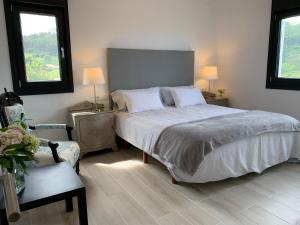 Кровать или кровати в номере Casa Paloma