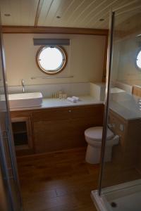 a bathroom with a toilet and a sink at Tagus Marina in Lisbon +12 photos