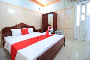 Postel nebo postele na pokoji v ubytování Chin Sao Hotel Nguyen Thi Thap