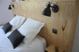 מיטה או מיטות בחדר ב-À tire-larigot