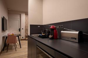 a kitchen with a counter with a appliance on it at SUITE 1907 OVIEDO Low Cost in Oviedo