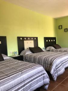 Letto o letti in una camera di Posada Quinta Alejandra