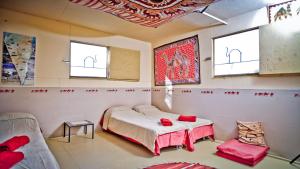 Кровать или кровати в номере Negev Camel Ranch