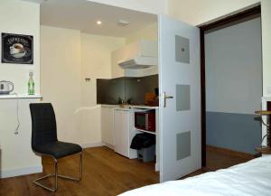 Μια τηλεόραση ή/και κέντρο ψυχαγωγίας στο Apparthotel Douai Gare