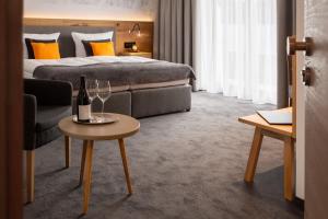 Postel nebo postele na pokoji v ubytování Hotel Tannenhaus