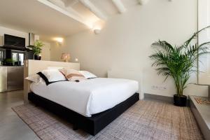 Uma cama ou camas num quarto em Maison Cabral