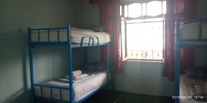 Postel nebo postele na pokoji v ubytování Canal Hostel