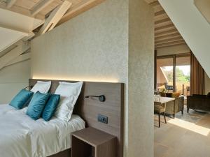 Postel nebo postele na pokoji v ubytování Boutique Hotel Ter Wallen + 37 fotografií