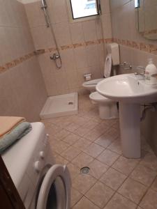 Koupelna v ubytování Apartament Gloria&Mitati + 37 fotografií