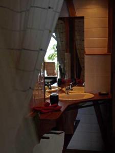 Reštaurácia alebo iné gastronomické zariadenie v ubytovaní Villa Mahogany